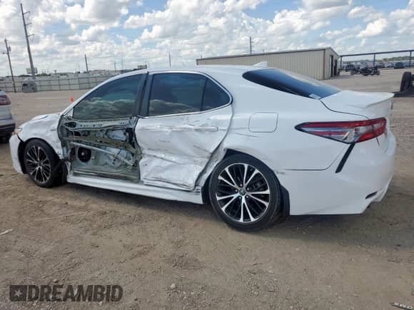2019 Toyota Camry Hybrid LE с VIN 4T1B21HK5KU517610, выставлен на аукционе Copart как лот 63081855 с пробегом 120 270 миль миль и Списание • Salvage title. История ставок и продаж доступна на DreamBid. Изображение 2.