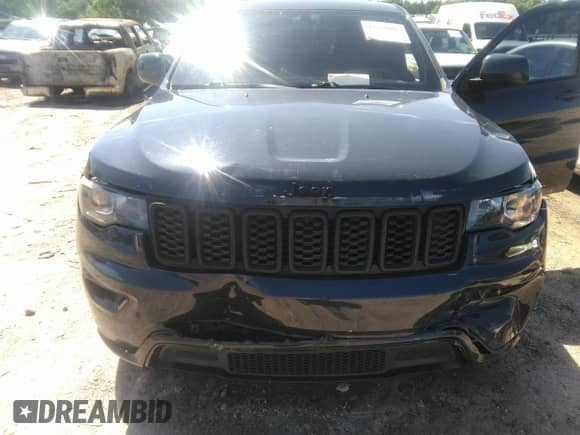 2017 Jeep Grand Cherokee Laredo with VIN 1C4RJEAG8HC722291, listed as a IAAI auction lot 42720085 with 140,382 mi miles and . Bid and sale history available at DreamBid. Image 6.