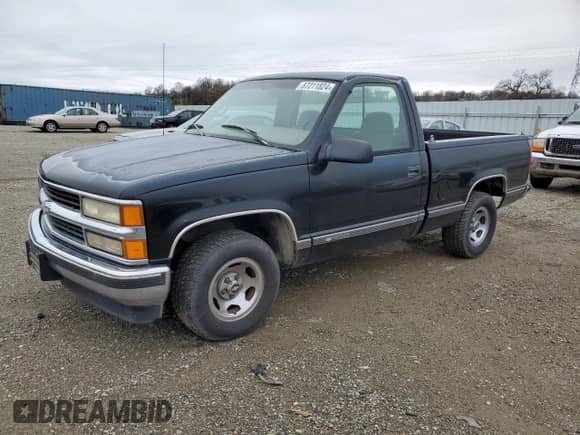 1997 Chevrolet Silverado 1500 with VIN 1GCEC14R5VZ187489, listed as a Copart auction lot 87211824 with 211,353 mi miles and Clean title. Bid and sale history available at DreamBid. Image 1.