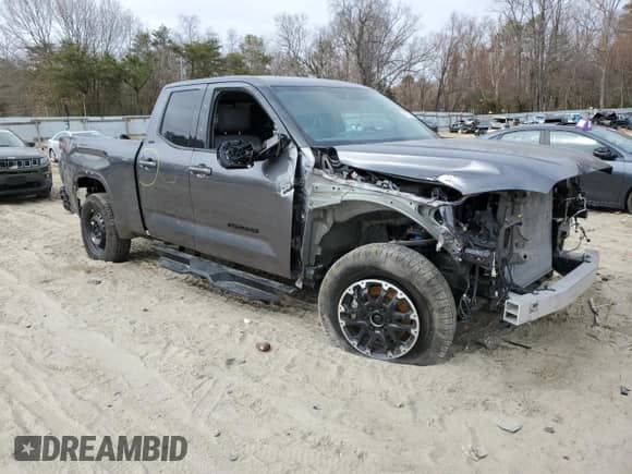 2023 Toyota Tundra SR5 with VIN 5TFLA5DA4PX065963, listed as a Copart auction lot 48775395 with 28,681 mi miles and Salvage title. Bid and sale history available at DreamBid. Image 4.