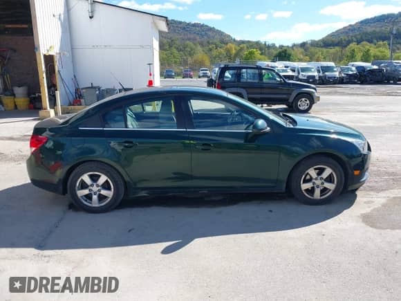 2014 Chevrolet Cruze 1LT с VIN 1G1PC5SB4E7209685, выставлен на аукционе IAAI как лот 43410064 с пробегом 167 817 миль миль и . История ставок и продаж доступна на DreamBid. Изображение 13.