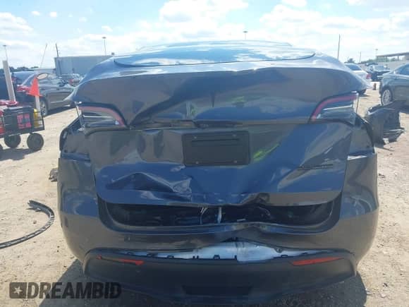 2023 Tesla Model Y Performance with VIN 7SAYGDEF4PF785348, listed as a IAAI auction lot 43314002 with 62,857 mi miles and . Bid and sale history available at DreamBid. Image 16.