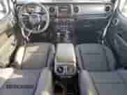 2023 Jeep Wrangler Sport S с VIN 1C4HJXDG5PW502753, выставлен на аукционе Copart как лот 64839795 с пробегом 52 018 миль миль и Чистый • Clean title. История ставок и продаж доступна на DreamBid. Изображение 8.