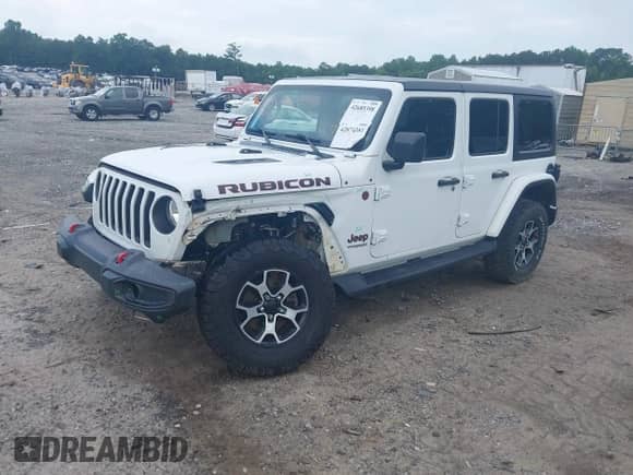 2021 Jeep Wrangler Unlimited Rubicon with VIN 1C4HJXFG9MW714239, listed as a IAAI auction lot 42874381 with 81,545 mi miles and . Bid and sale history available at DreamBid. Image 2.