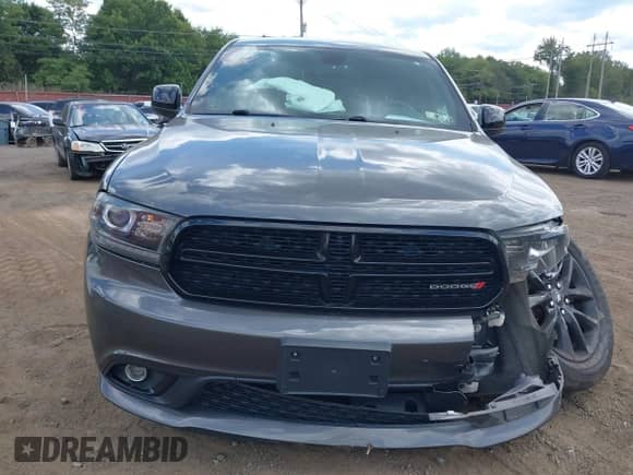 2019 Dodge Durango SXT with VIN 1C4RDJAG2KC599580, listed as a IAAI auction lot 43104403 with 108,136 mi miles and . Bid and sale history available at DreamBid. Image 17.