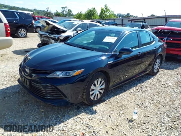 2020 Toyota Camry Hybrid LE with VIN 4T1E31AK9LU019478, listed as a IAAI auction lot 43097201 with 48,313 mi miles and . Bid and sale history available at DreamBid. Image 2.