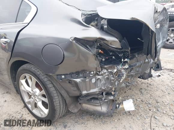 2014 Nissan Maxima SV z VIN 1N4AA5AP6EC488005, wystawiony jako IAAI lot #42894857 z przebiegiem 93 618 mil mil oraz . Historia ofert i sprzedaży dostępna na DreamBid. Obrazek 6.