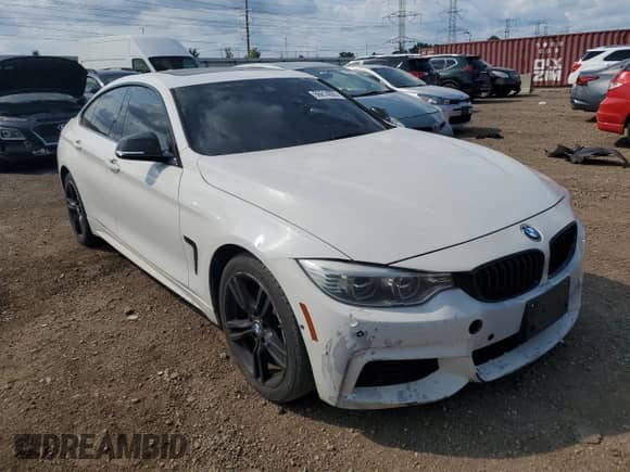 2015 BMW 4 Series 428i xDrive z VIN WBA4C9C50FG135027, wystawiony jako Copart lot #66614055 z przebiegiem 197 564 mil mil oraz Czysty tytuł • Clean title. Historia ofert i sprzedaży dostępna na DreamBid. Obrazek 4.