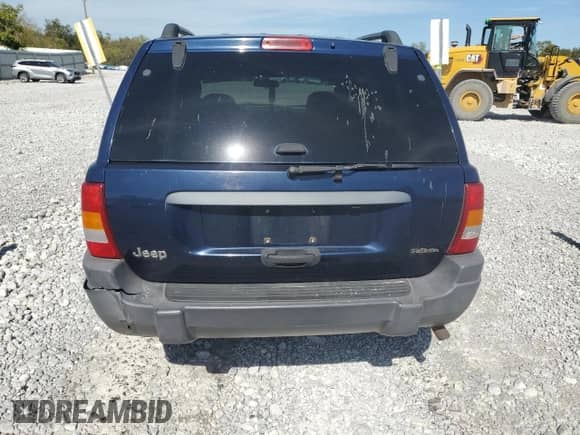 2004 Jeep Grand Cherokee Laredo with VIN 1J4GX48S14C220124, listed as a Copart auction lot 84979245 with 237,797 mi miles and Salvage title. Bid and sale history available at DreamBid. Image 6.