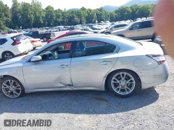 2014 Nissan Maxima SV z VIN 1N4AA5AP3EC905869, wystawiony jako IAAI lot #42833708 z przebiegiem 78 198 mil mil oraz . Historia ofert i sprzedaży dostępna na DreamBid. Obrazek 15.