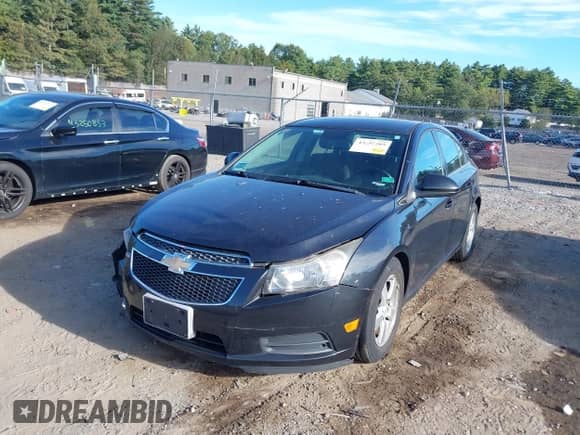 2013 Chevrolet Cruze 1LT with VIN 1G1PC5SB8D7220638, listed as a IAAI auction lot 43255265 with 98,332 mi miles and . Bid and sale history available at DreamBid. Image 2.