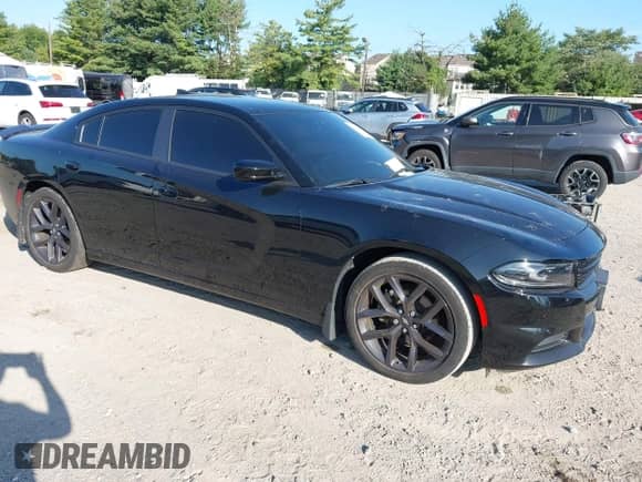 2023 Dodge Charger SXT z VIN 2C3CDXBG5PH545030, wystawiony jako IAAI lot #42926671 z przebiegiem 48 772 mil mil oraz . Historia ofert i sprzedaży dostępna na DreamBid. Obrazek 1.