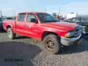 2002 Dodge Dakota SLT с VIN 1B7HG48N42S595562, выставлен на аукционе IAAI как лот 42107671 с пробегом 170 379 миль миль и . История ставок и продаж доступна на DreamBid. Изображение 1.
