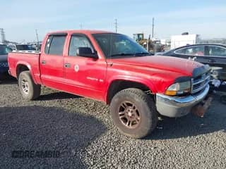 2002 Dodge Dakota SLT with VIN 1B7HG48N42S595562, listed as a IAAI auction lot 42107671 with 170,379 mi miles and . Bid and sale history available at DreamBid. Image 1.