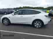 2022 Tesla Model Y Long Range z VIN 7SAYGDEE6NF317707, wystawiony jako IAAI lot #43186532 z przebiegiem 45 306 mil mil oraz . Historia ofert i sprzedaży dostępna na DreamBid. Obrazek 15.