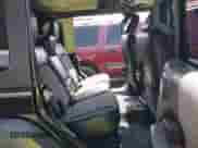 2021 Jeep Wrangler Unlimited Sport Altitude with VIN 1C4HJXDN5MW670810, listed as a IAAI auction lot 42562339 with 136,697 mi miles and . Bid and sale history available at DreamBid. Image 8.