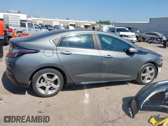 2017 Chevrolet Volt LT z VIN 1G1RA6S53HU178322, wystawiony jako IAAI lot #43347517 z przebiegiem 117 688 mil mil oraz . Historia ofert i sprzedaży dostępna na DreamBid. Obrazek 14.