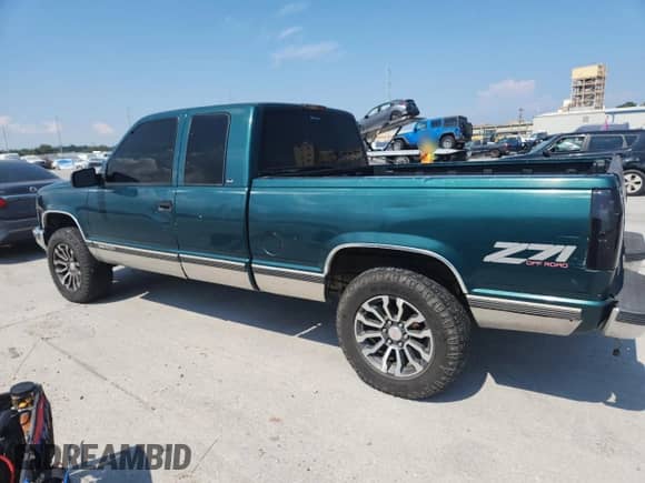 1997 GMC Sierra 1500 с VIN 2GTEK19R3V1554913, выставлен на аукционе Copart как лот 80281485 с пробегом 246 907 миль миль и Списание • Salvage title. История ставок и продаж доступна на DreamBid. Изображение 2.