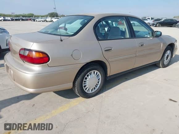 2004 Chevrolet Malibu Classic z VIN 1G1ND52F04M637230, wystawiony jako IAAI lot #40837935 z przebiegiem 56 072 mil mil oraz . Historia ofert i sprzedaży dostępna na DreamBid. Obrazek 4.