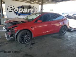 2022 Tesla Model Y Performance with VIN 7SAYGDEF7NF491875, listed as a Copart auction lot 81700525 with 63,278 mi miles and Salvage title. Bid and sale history available at DreamBid. Image 1.