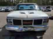 1992 GMC Sierra 1500 z VIN 1GTEC14HXNE531901, wystawiony jako Copart lot #49402525 z przebiegiem 233 722 mil mil oraz Szkoda całkowita • Salvage title. Historia ofert i sprzedaży dostępna na DreamBid. Obrazek 5.