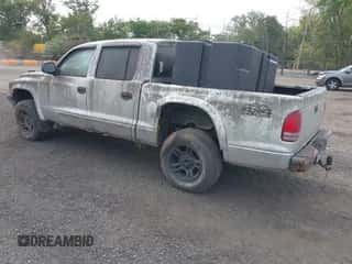 2003 Dodge Dakota Sport with VIN 1D7HG38N53S296504, listed as a IAAI auction lot 43349401 with 196,730 mi miles and . Bid and sale history available at DreamBid. Image 3.