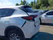 2023 Mazda CX-5 S Select z VIN JM3KFBBM2P0248805, wystawiony jako IAAI lot #43233942 z przebiegiem 41 692 mil mil oraz . Historia ofert i sprzedaży dostępna na DreamBid. Obrazek 19.