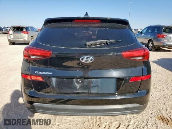 2019 Hyundai Tucson SE с VIN KM8J23A45KU865037, выставлен на аукционе Copart как лот 91181875 с пробегом 81 474 миль миль и Чистый • Clean title. История ставок и продаж доступна на DreamBid. Изображение 6.