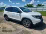2019 Honda Passport EX-L with VIN 5FNYF8H55KB024525, listed as a Copart auction lot 63112425 with 87,126 mi miles and Salvage title. Bid and sale history available at DreamBid. Image 4.