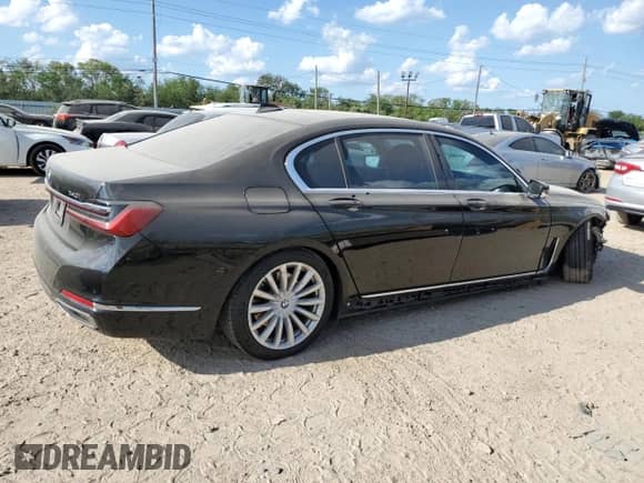 2022 BMW 7 Series 740i xDrive with VIN WBA7T4C07NCH70453, listed as a Copart auction lot 71671304 with 44,673 mi miles and Clean title. Bid and sale history available at DreamBid. Image 3.