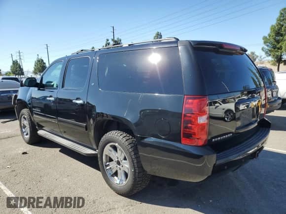 2013 Chevrolet Suburban LT z VIN 1GNSCJE06DR100546, wystawiony jako Copart lot #86519335 z przebiegiem 192 147 mil mil oraz Szkoda całkowita • Salvage title. Historia ofert i sprzedaży dostępna na DreamBid. Obrazek 2.