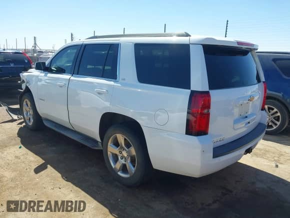 2015 Chevrolet Tahoe LS with VIN 1GNSCAKC5FR119378, listed as a IAAI auction lot 41759734 with Not provided miles and . Bid and sale history available at DreamBid. Image 3.