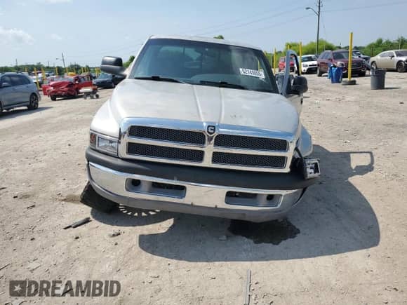 1999 Dodge 2500 with VIN 3B7KF2362XG182518, listed as a Copart auction lot 62145055 with Not provided miles and Salvage title. Bid and sale history available at DreamBid. Image 5.