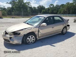 2001 Honda Accord EX with VIN 1HGCG66871A148166, listed as a Copart auction lot 67564425 with 90,069 mi miles and Salvage title. Bid and sale history available at DreamBid. Image 1.