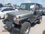 2003 Jeep Wrangler Sport z VIN 1J4FA49S03P326437, wystawiony jako IAAI lot #42702949 z przebiegiem 90 710 mil mil oraz . Historia ofert i sprzedaży dostępna na DreamBid. Obrazek 2.