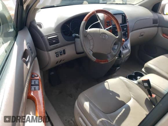 2010 Toyota Sienna XLE с VIN 5TDYK4CC9AS290084, выставлен на аукционе Copart как лот 71271375 с пробегом 95 684 миль миль и Списание • Salvage title. История ставок и продаж доступна на DreamBid. Изображение 8.