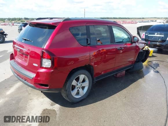2014 Jeep Compass Latitude with VIN 1C4NJCEB4ED651713, listed as a IAAI auction lot 43305790 with 139,289 mi miles and . Bid and sale history available at DreamBid. Image 4.