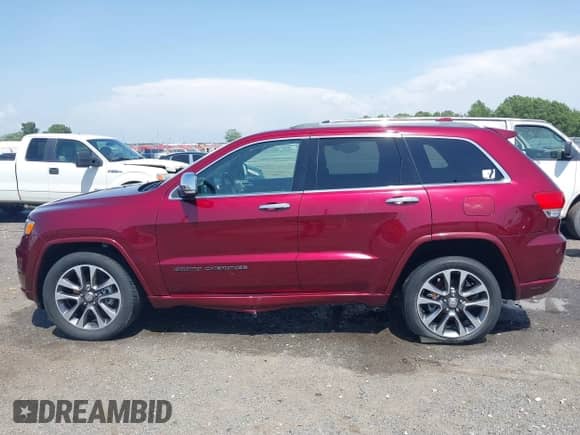 2017 Jeep Grand Cherokee Overland with VIN 1C4RJFCG7HC658943, listed as a IAAI auction lot 42282213 with 103,291 mi miles and . Bid and sale history available at DreamBid. Image 14.