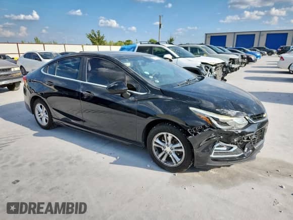 2016 Chevrolet Cruze LT with VIN 1G1BE5SM6G7319467, listed as a Copart auction lot 69517925 with 97,797 mi miles and Salvage title. Bid and sale history available at DreamBid. Image 4.