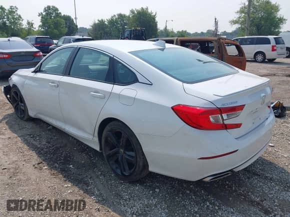 2020 Honda Accord Sport with VIN 1HGCV1F36LA136011, listed as a IAAI auction lot 42881269 with 87,229 mi miles and . Bid and sale history available at DreamBid. Image 3.