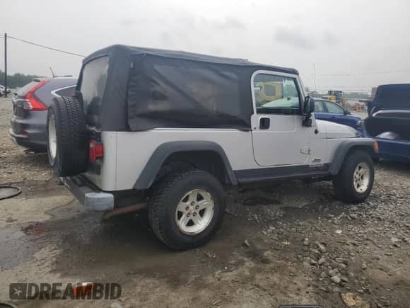 2004 Jeep Wrangler Sport z VIN 1J4FA49SX4P764853, wystawiony jako Copart lot #67621195 z przebiegiem 183 544 mil mil oraz Szkoda całkowita • Salvage title. Historia ofert i sprzedaży dostępna na DreamBid. Obrazek 3.