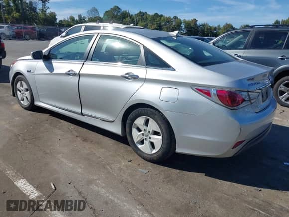 2012 Hyundai Sonata Hybrid z VIN KMHEC4A46CA034105, wystawiony jako IAAI lot #43371665 z przebiegiem 159 568 mil mil oraz . Historia ofert i sprzedaży dostępna na DreamBid. Obrazek 3.