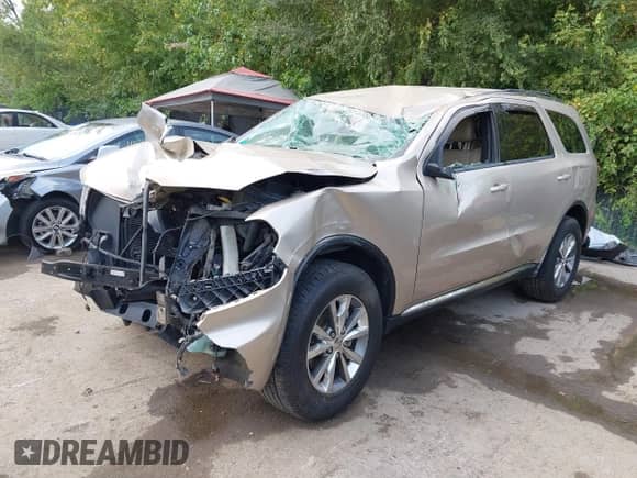 2014 Dodge Durango Limited z VIN 1C4RDJDG8EC524799, wystawiony jako IAAI lot #43227664 z przebiegiem 153 039 mil mil oraz . Historia ofert i sprzedaży dostępna na DreamBid. Obrazek 2.