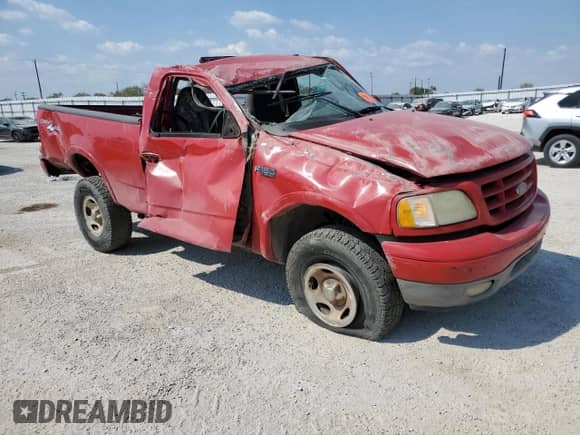 2003 Ford F-150 XL z VIN 1FTRF18223NA52111, wystawiony jako Copart lot #74816344 z przebiegiem 175 021 mil mil oraz Szkoda całkowita • Salvage title. Historia ofert i sprzedaży dostępna na DreamBid. Obrazek 4.