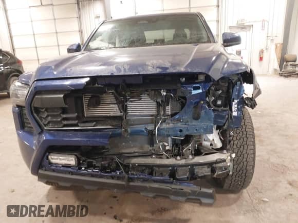 2024 Toyota Tacoma SR5 with VIN 3TMLB5JN3RM054207, listed as a IAAI auction lot 41171946 with 3,808 mi miles and . Bid and sale history available at DreamBid. Image 6.