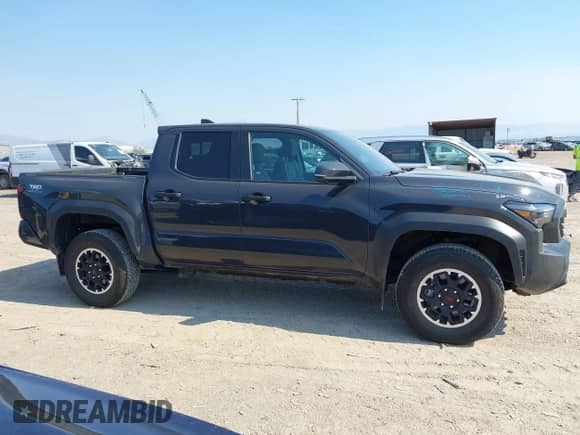 2024 Toyota Tacoma TRD Off Road with VIN 3TMLB5JN7RM069938, listed as a IAAI auction lot 43056789 with 6,837 mi miles and . Bid and sale history available at DreamBid. Image 13.