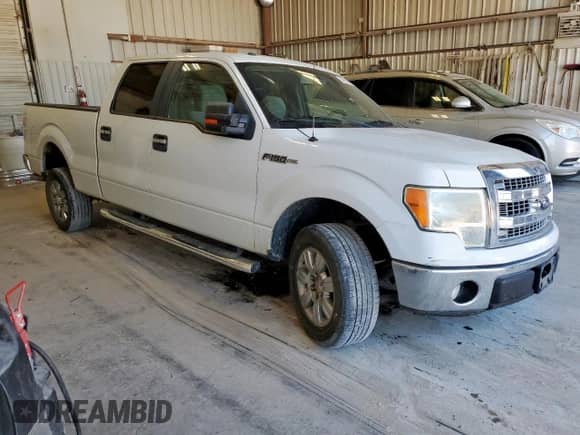 2013 Ford F-150 XLT with VIN 1FTFW1CF2DKE33473, listed as a Copart auction lot 84597495 with 231,265 mi miles and Clean title. Bid and sale history available at DreamBid. Image 4.