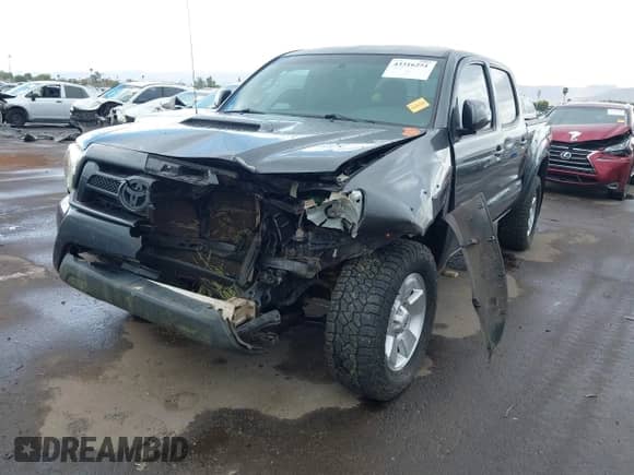 2015 Toyota Tacoma PreRunner z VIN 3TMJU4GN0FM185366, wystawiony jako IAAI lot #43316251 z przebiegiem 77 520 mil mil oraz . Historia ofert i sprzedaży dostępna na DreamBid. Obrazek 6.