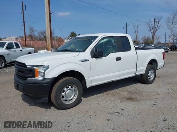 2020 Ford F-150 XL with VIN 1FTFX1E43LFA58449, listed as a IAAI auction lot 41769410 with 74,165 mi miles and . Bid and sale history available at DreamBid. Image 2.