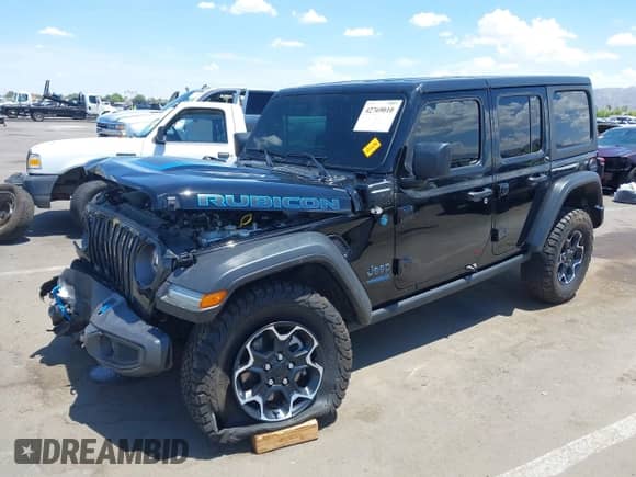 2022 Jeep Wrangler Unlimited Rubicon with VIN 1C4JJXR64NW256714, listed as a IAAI auction lot 42769010 with 35,291 mi miles and . Bid and sale history available at DreamBid. Image 18.